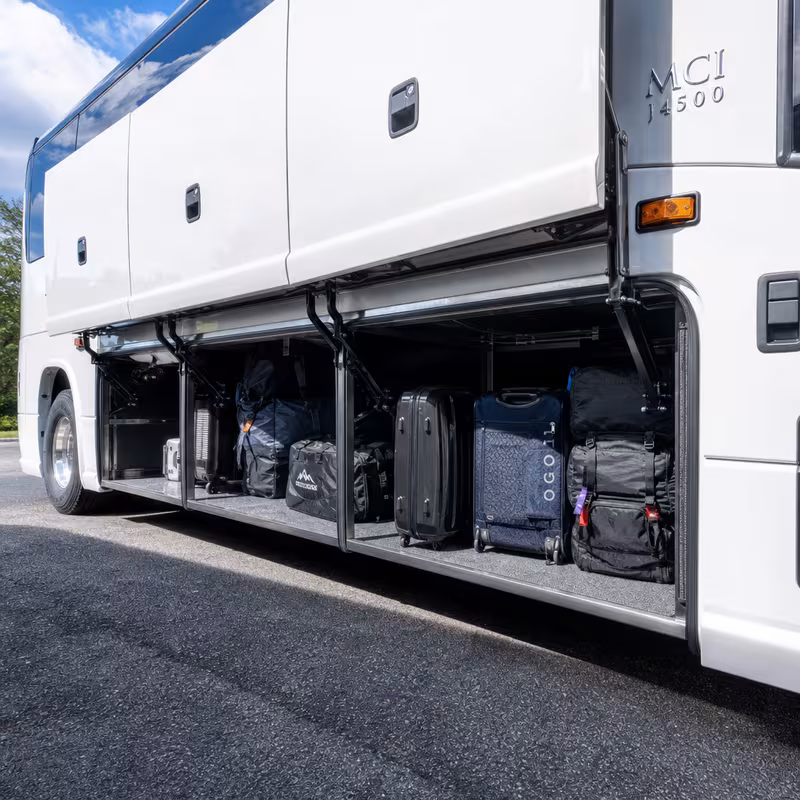 Party bus interior with wraparound leather seating and LED lighting in Las Vegas