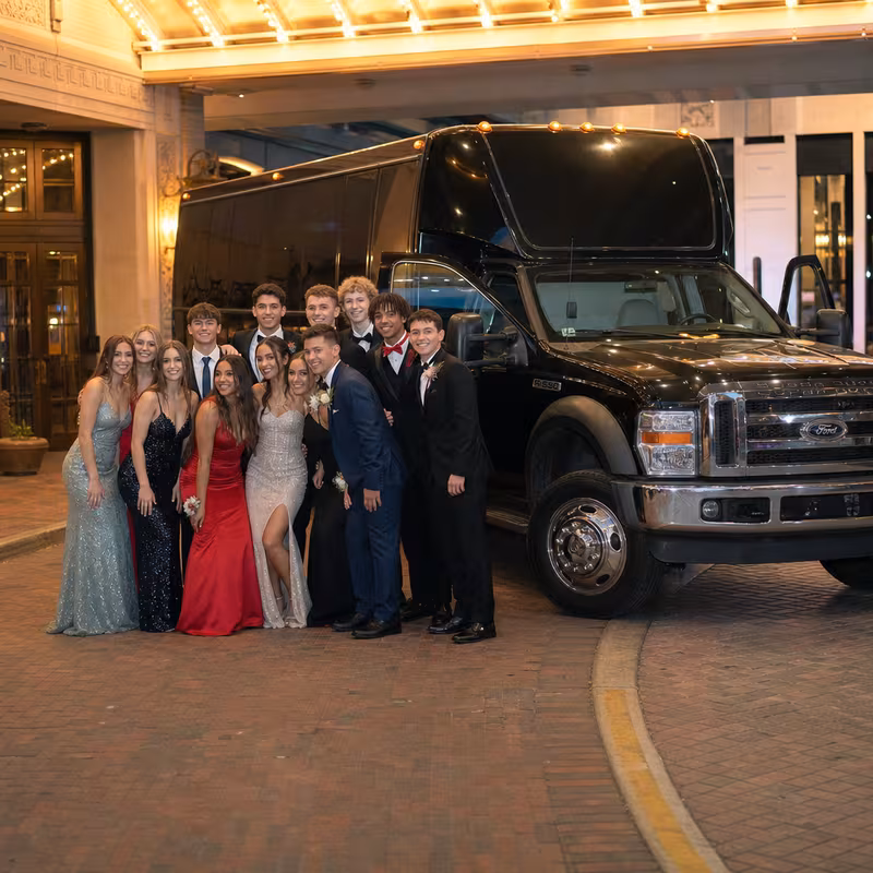 Party bus interior with wraparound leather seating and LED lighting in Las Vegas