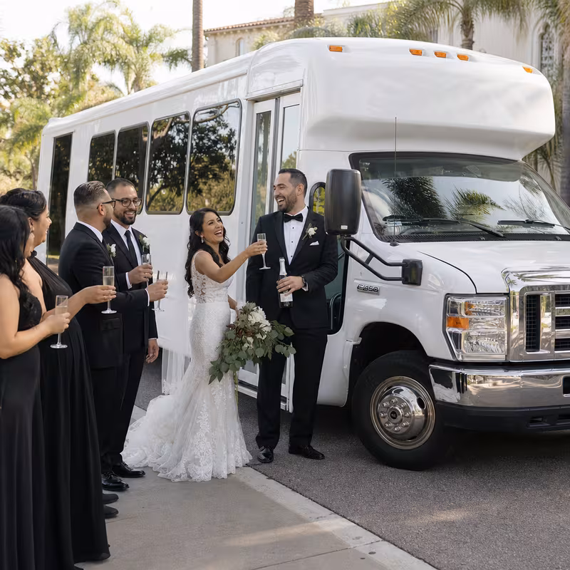 Passengers loading luggage while boarding an Las Vegas group shuttle